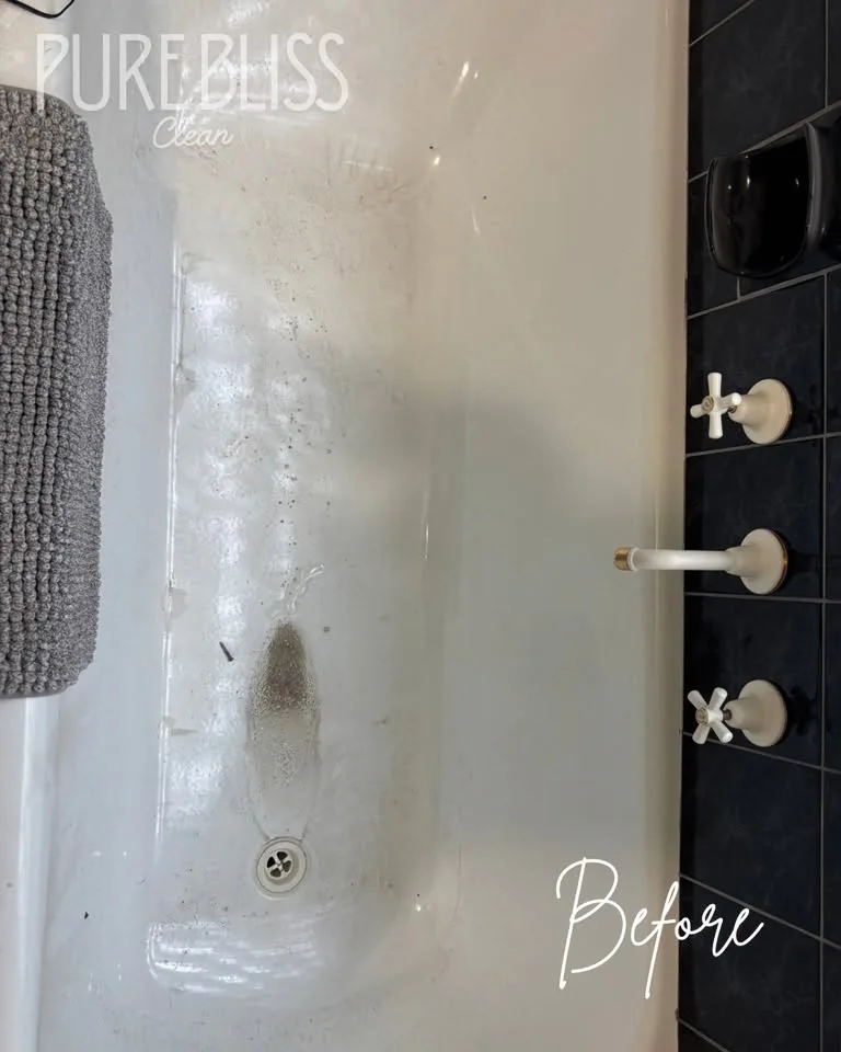Bathtub with marks and build-up before a Pure Bliss Clean